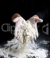 white wheat flour in male hands