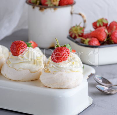 baked meringue with cream and fresh strawberries