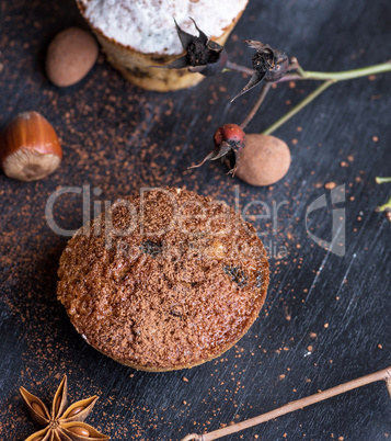 baked muffins on a black table