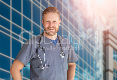 Caucasian Male Nurse In Front Of Hospital Building