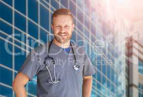 Caucasian Male Nurse In Front Of Hospital Building