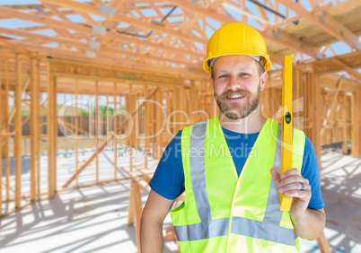 Caucasian Male Contractor With Hard Hat, Level and Safety Vest