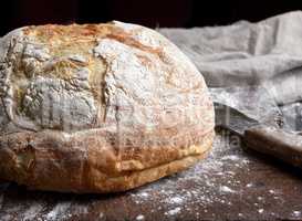 baked round white wheat bread