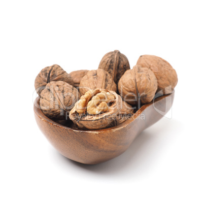 Organic French walnuts in a wooden bowl