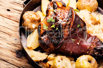 Pork knuckle with fried sauerkraut