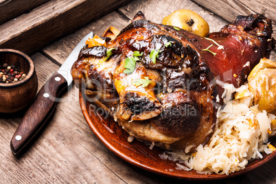 Pork knuckle with fried sauerkraut