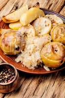 Baked potatoes, apples and sauerkraut.