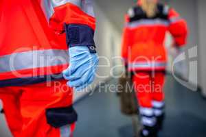 German paramedic runs in a floor to an accident