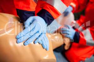 German paramedic trains emergency basics on a puppet