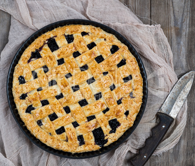 baked round black currant cake