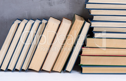 stack of various books on the table