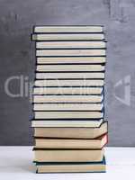 stack of books in a blue cover