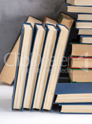 books with blue cover, black background