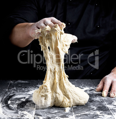 male hands substitute white wheat flour dough