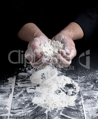 white wheat flour in male hands