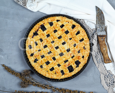 baked round black currant cake