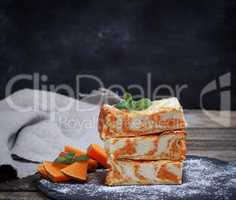 square pieces of cheesecake with pumpkin
