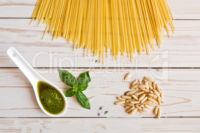 Pesto genovese sauce and linguine pasta, pine nuts and garlic on