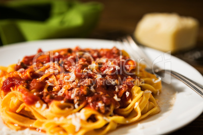 Closeup of tagliatelle pasta with bolognese ragu