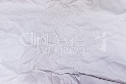 Background or pattern of wrinkled white rectangular paper with soft texture