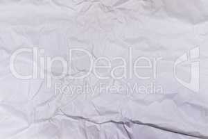 Background or pattern of wrinkled white rectangular paper with soft texture