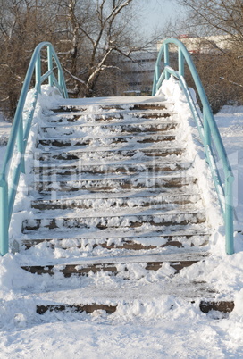 bridge over pond at winter