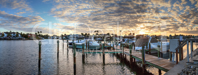 Harbor with boats at golden hour as day breaks over the North Gu