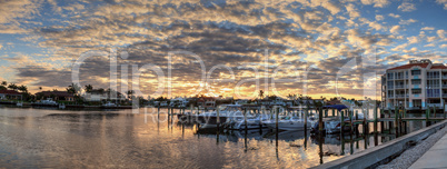 Harbor with boats at golden hour as day breaks over the North Gu