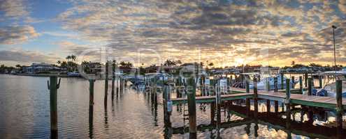 Harbor with boats at golden hour as day breaks over the North Gu