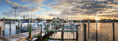 Harbor with boats at golden hour as day breaks over the North Gu