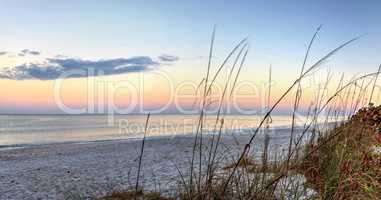 Sunrise over North Gulf Shore Beach along the coastline