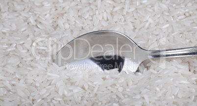 rice background and teaspoon