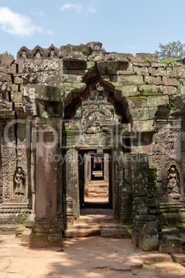 Corridor through stone doorways at Ta Som