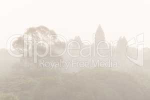Aerial view of Angkor Wat in mist