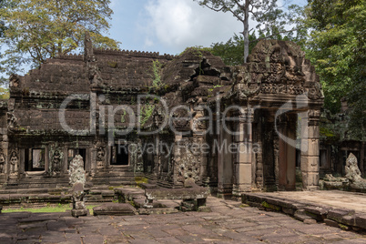 Banteay Kdei temple with portico in trees