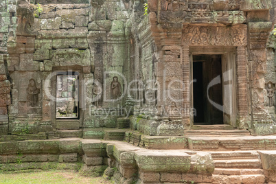 Decorated doorway and bas-reliefs at Ta Som