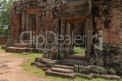 Doorways to stone temple with decorated pediments