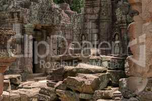 Fallen blocks block courtyard by temple doorway
