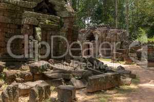 Fallen stone blocks litter grounds of temple
