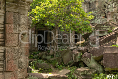 Pile of rocks by two temple doorways