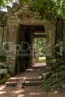 Ruined stone entrance in Banteay Kdei walls