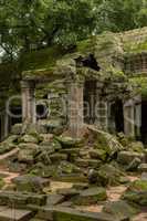 Ruined temple portico blocked by fallen rocks