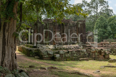 Ruins of old stone temple in forest