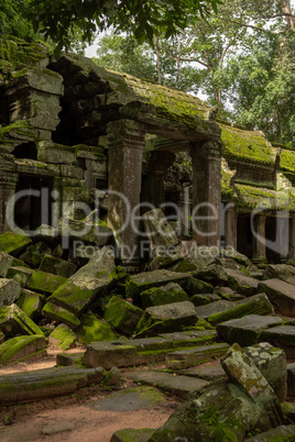 Ruins of temple entrance by fallen rocks