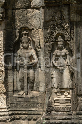 Statues of man with sword and wife