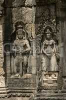 Statues of man with sword and wife