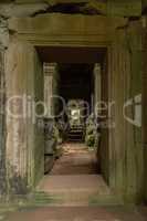 Stone corridor ending in pile of rubble