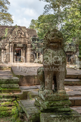 Stone lion guards entrance to Banteay Kdei