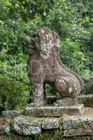 Stone lion guards entrance to East Mebon