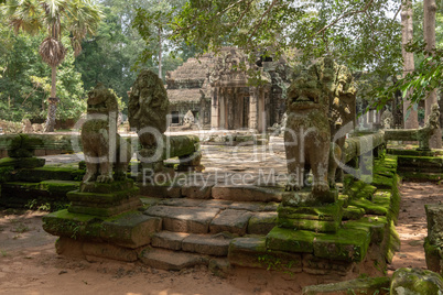 Stone lions and snake heads guard temple